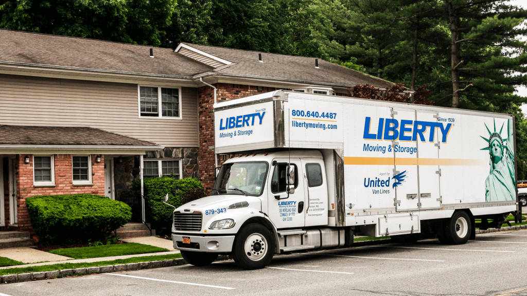 Liberty moving truck in front of house