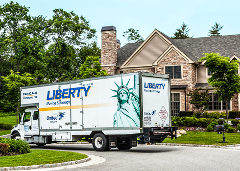 Liberty truck outside a home